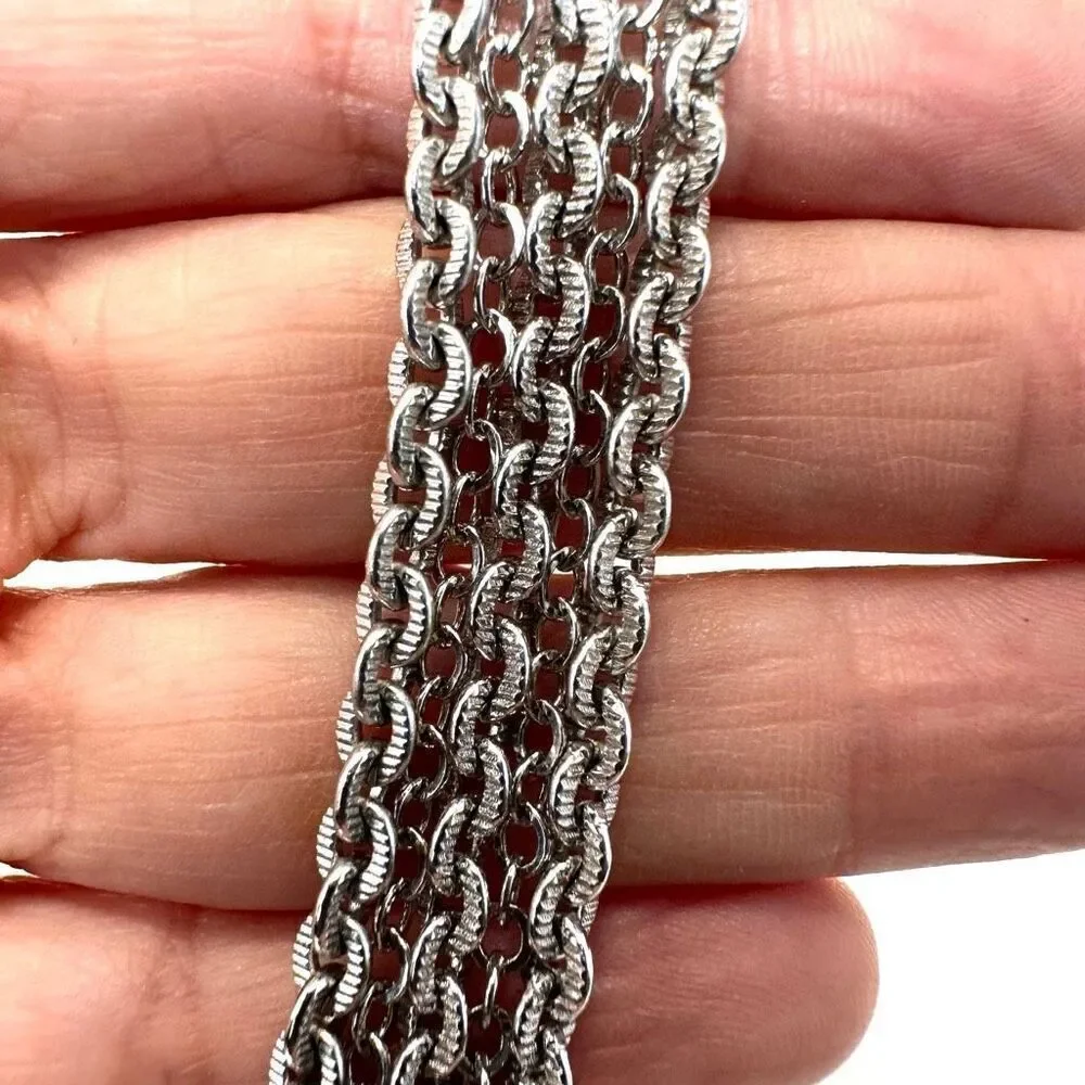 Avon silver tone multi chain bracelet